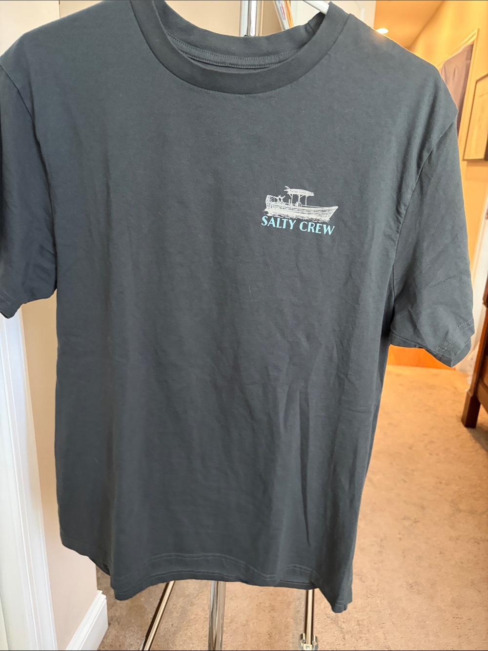 Salty Crew Black Short Sleeve Tee with Light Blue Boat Logo